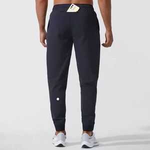 2024 lululemenI Calças compridas masculinas Jogger Sport Yoga Outfit Secagem rápida Cordão Ginásio Bolsos Sweatpants Calças Mens Casual Cintura Elástica Movimento Fiess hju668