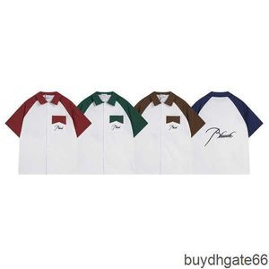 YT3P Men's Casual Shirts Rätt version av Rhude Summer New Product Patchwork Pockets broderade män och kvinnor Lossa modemärke Kort ärmskjorta trendig