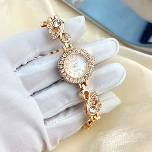 Orologio al quarzo semplice con quadrante piccolo da donna con bracciale con rondine e cigno con diamanti