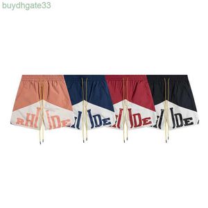 Axyv Men's Shorts Rhude Patchwork Color ContrastレタープリントカプリストレートロープハイストリートカジュアルサマールーズストレートチューブメンズアンドレディースショーツV2VB