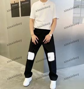 Xinxinbuy Homens Mulheres Designer Pant Paris Joelho Floral Carta Imprimir Denim Primavera Verão Calças Casuais Preto Azul XS-XL