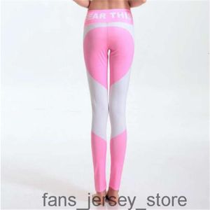 2024 Abiti da yoga femminili Leggings a vita alta senza cuciture Leggins push up Sport Donna Fitness Corsa Pantaloni elastici energetici Collant da palestra per ragazza Buono 092