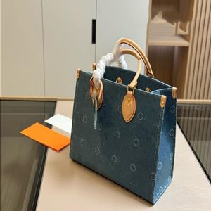 24SS Women's Luxury Handbag Designer New Denim Shopping Bag Women's Handbag Shouling Bag Storage Bag Jungle Shopping Bag 36 CM JKHO