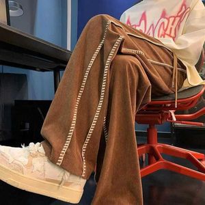 Pantaloni Maillard in velluto a coste marrone caffè con una sensazione pigra e cadente, sportivi casual da uomo, leggermente svasati