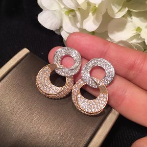 Fashion glittering geometric twisted circle stud earrings sparky diamond crystal cubiz zirconia stylish earrings for woman girls birthday gift