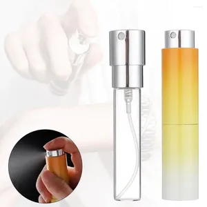 Bottiglie di stoccaggio 8ML Atomizzatore di profumo rotante con gradiente Mini Spruzzatore da viaggio ricaricabile vuoto Contenitore spray portatile a prova di perdite