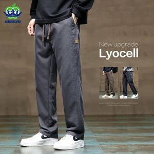 Outono inverno macio lyocell tecido calças dos homens grosso solto cordão reto cintura elástica coreia calças casuais plus size 4xl 240319