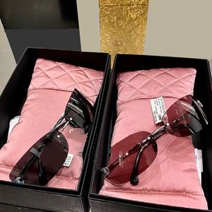 Womens Fashion Frameless Sunglasses Luxury Crystal Decorative Mirror Metal Mirror Leg Oval Goggles Large Frame UV400 Resistant Sunglasses A71560