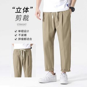 Sprężyna i letnie cienkie nylonowe lodowe spodni swobodne spodnie dla mężczyzn Khaki przycięte oddychające w nowym modelu 2024