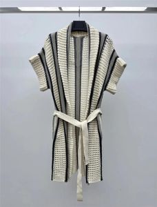 Kvinnors stickor 2024 Spring Striped Mesh Sequin Knit Kort ärm i mitten av Cardigan Jacket