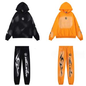 High Quality American Fashion Brand Printed Distressed Clay Print Loose Hooded Sweatshirt Pants for Men and Women in A Couple's Set