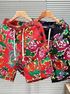 Calças de 5 pontos Nordeste Big Flower para homens Cross border Comércio Exterior Calças de praia de verão para homens Shorts esportivos para homens Calças de perna reta de 5 pontos Tendência