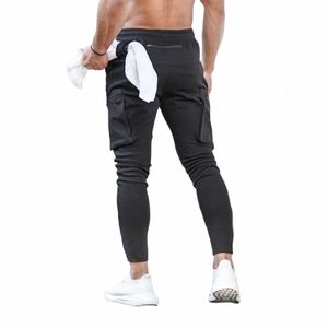 Przypadkowe nowe męskie spodnie Fitn Men Men Mężczyzn Sportswear Bottoms Chude spodnie spodnie Black Gyms Jogger Track Pants B2Zn#