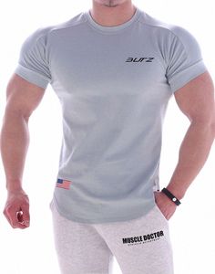 Nuova t-shirt maschile sport a maniche corta