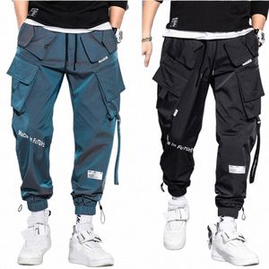 tunn streetwear casual byxor män band harem jogging byxa manliga smala fit fjäderlastbyxor multi-fickor kvinnor byxa k12 601d#