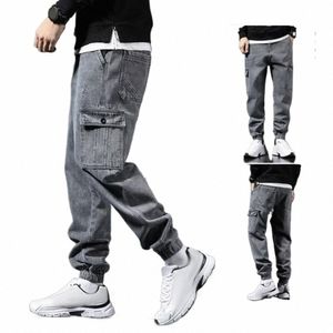 Vår sommarlastbyxor män streetwear lösa denim joggar byxor multi fickor baggy harem jean byxor manliga svettbyxor a2hk#