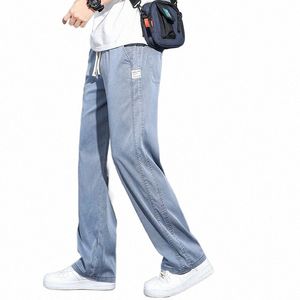 Summer Soft Lyocell Fabric Men's Jeans tunna lösa raka byxor som drabbas av elastisk midja Korea Casual byxor plus storlek M-5XL 62Y5#