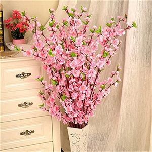 装飾的な花3PCS 65cm人工桃の花の枝シルクチェリーツリーステム偽の植物の花の花束ホームガーデンディーウェディング