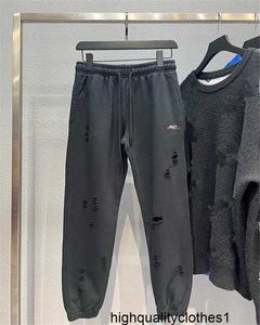 Designer Versione alta 22ss all'inizio della primavera pantaloni con buco di coca cola nelle coppie pantaloni da lavaggio casual JUPG