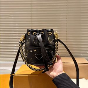 24SS Women's Luxury Designer New Willow Nail Rich Bucket Bag Women's Hand Chain Bag Crossbody Bag Axelväska Purse Gold Met Dpul