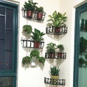 Racks Geometria Quente Triângulo de Ferro Suporte para flores Rack de armazenamento de canto com suspensão de parede Jardinagem Decoração de escritório doméstico