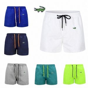 Högkvalitativ badklädernätfoder snabbtorkande sport sexiga simningstammar Sommarbroderi Briefs strandshorts för män T01A#