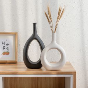 Vaser keramik vas heminredning oval ihålig blomma vas modern dekorativa vaser rum dekor blomkrukor mittstycke figurer prydnad