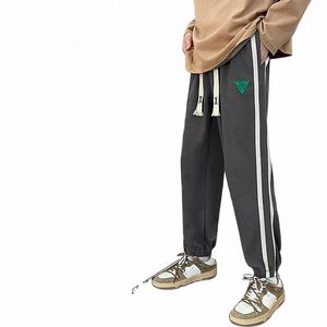 Casual Jogger Pants Men Urban Casual Confortável Calças Unissex Cintura Elástica Sweatpant All-Match Cordão Solto Calças de Ginástica B6mK #