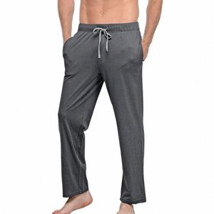 Mężczyznowe spodnie domowe solidny kolor elastyczne talia mężczyźni Pajama Spodnie kieszenie na sznurka odzież domowa