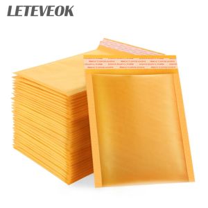 Envoltório 100pcs amarelo papel kraft bolha envelopes sacos de correio acolchoados sacos de envio para embalagem boutique presente envoltório bolsa