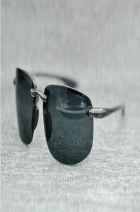 Designer di marca Mcy Jim 407 occhiali da sole Lenti polarizzate senza montatura di alta qualità uomo donna guida Occhiali da sole con custodia2217088