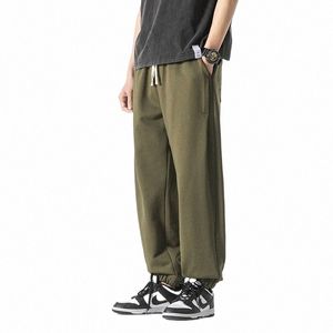 Męskie jogger dresspants fi sznurka streetwear sportowe swobodne workowate spodnie męskie botki luźne spodnie nóg plus rozmiar 8xl i8kc#