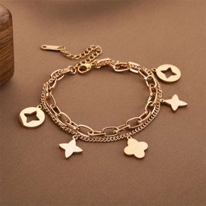 Classic New Van Clover bracelet High-grade personalised hollow four-leaf clover bracelet Women's non-fading fashion prismatic small flower bracelet