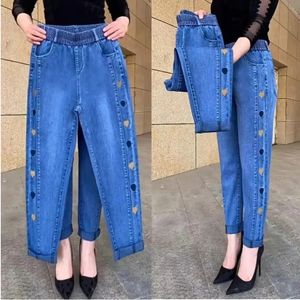 Winterembroidery dżinsy damskie elastyczne dżinsy z wysokiej talii 5xl moda black blue kieszeni mama dżinsy chude elastyczne spodnie kobiety 240319
