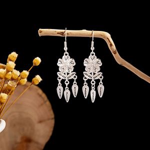 Imitation silver Miao earrings, ethnic minority tourist attraction earrings, Bohemian long leaf tassel earrings for gift collection6