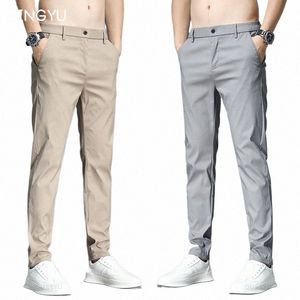 vår sommar casual byxor män tunn stretch smal passform elastisk midjebusin klassiska koreanska byxor man khaki grå 38 w4ww#