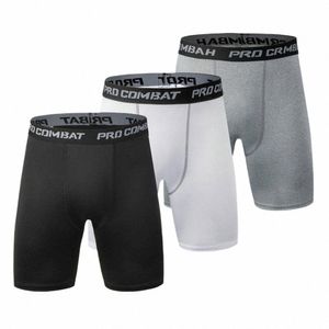 Man Fitn Quick-Torking Tight Shorts Elastic Compri Leggings Training Pants Män som kör shorts Black Grey Plus Size 3XL Q61Y#