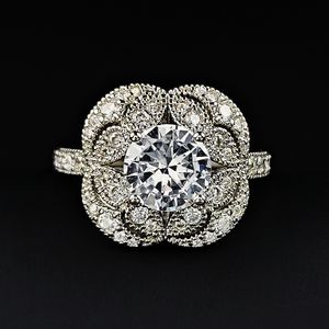 2024 Jóias de casamento feitas à mão Jóias vintage 925 Sterling prata redonda recortada topázia branca cz diamante gemas de gemas de festas anel de flores de noiva para o presente do dia da mãe 0J5k