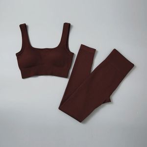 Set da yoga senza cuciture Completi da allenamento a coste per le donne Reggiseno sportivo Pantaloncini a vita alta Leggings da yoga Set Abbigliamento da palestra per fitness Completo sportivo 240323