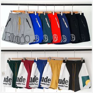 Shorts de natação de poliéster rhude designer shorts mens shorts praia troncos para natação rua hipster hipster carta impressão camo esportes malha relaxada carta relaxada A2