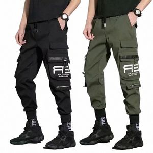 cienkie, swobodne spodnie Mężczyźni Wstątki haremowe spodnie do joggingu samce Slim Fit Spring Cargo Spodnie Multi-Pockets Spodni 44ke#