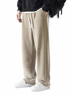 Zimowe gęste polarowe ciepłe dresowe menue streetwear szerokokadłubowe proste luźne spodnie na torze męskie swobodne spodnie termiczne W8N7#