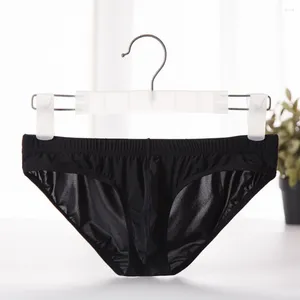 Mutande 1pc Slip tinta unita da uomo Pantaloncini Mutandine sexy dall'aspetto bagnato Tronchi ultra sottili trasparenti Lingerie Biancheria intima maschile