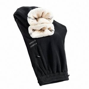 Zimowe spodnie mężczyźni ciepłe powiązane z kostką spodnie futrzane spodnie wyłożone mężczyźni grube spodnie dresowe spustę sznurka