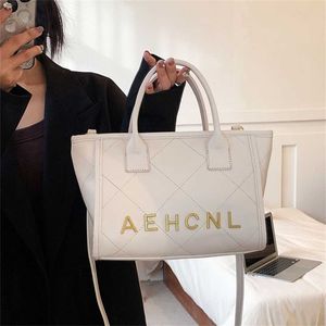 32% OFF Designer bag 2024 Handbags Beibei Shangpin Spring High end Simple Letter Beach Trendy Handheld One Shoulder Diagonal Straddle Womens