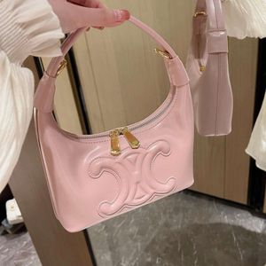 il negozio di borse di fabbrica venduto da arco di trionfo borsa da donna in vera pelle 2024 estate nuova moda una spalla croce gnocco tenuto in mano premium ascellare