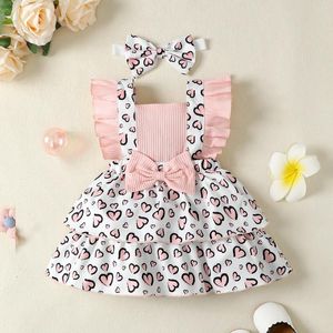 女の子のドレス3-24ヶ月のベビードレス幼児ヒョウ柄ハートハートフライスリーブフラワーアイン衣装夏のファッション服