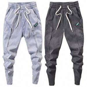 Wiosenne letnie dżinsowe spodnie dla mężczyzn projektant joggera kowbojski stylowy ładunek baggie harem koreańskie dżinsowe spodnie Y2ly##