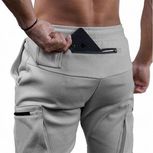 Joggers Erkekler 2021 Sokak Giyim Pantolonları Çok Fermuar Cepleri Kas Erkek Pantolon, Swearpants Takip 20CK19 I5AW#