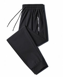 Męskie spodnie sportowe solidne lodowe jedwabne letnie spodnie luźna praca męska swobodna fi szybkie suszenie sporne sporne do męskich spodni 55KD#